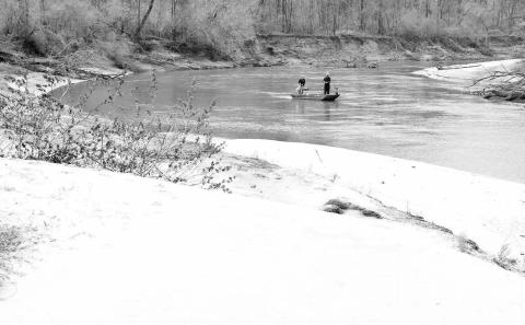 Major river systems that feed large reservoirs with abundant white bass populations are prone to come alive with the brawny sport fish during early spring as the annual spawning run kicks in to gear. (Photo by Matt Williams)