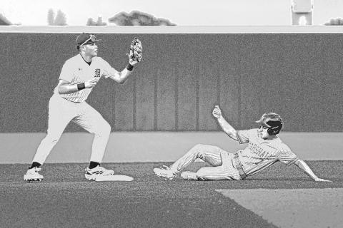 Nate Copado looks to turn two during the Tigers win over Marshall.