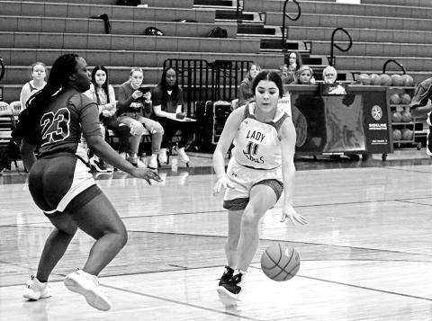 Rivercrest’s Diana Kelley makes a move towards the basket during last week’s game against Daingerfield. The Lady Rebels won, 47-9. Rivercrest will take on Paris Warriors Thursday evening and host Bloomburg Friday afternoon. TRIBUNE PHOTO / QUINTEN BOYD